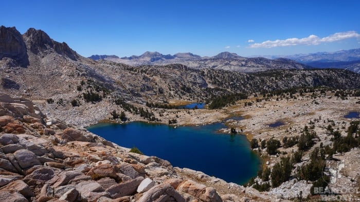 the top of Silver Pass on the JMT, looking lanugo on a undecorous lake