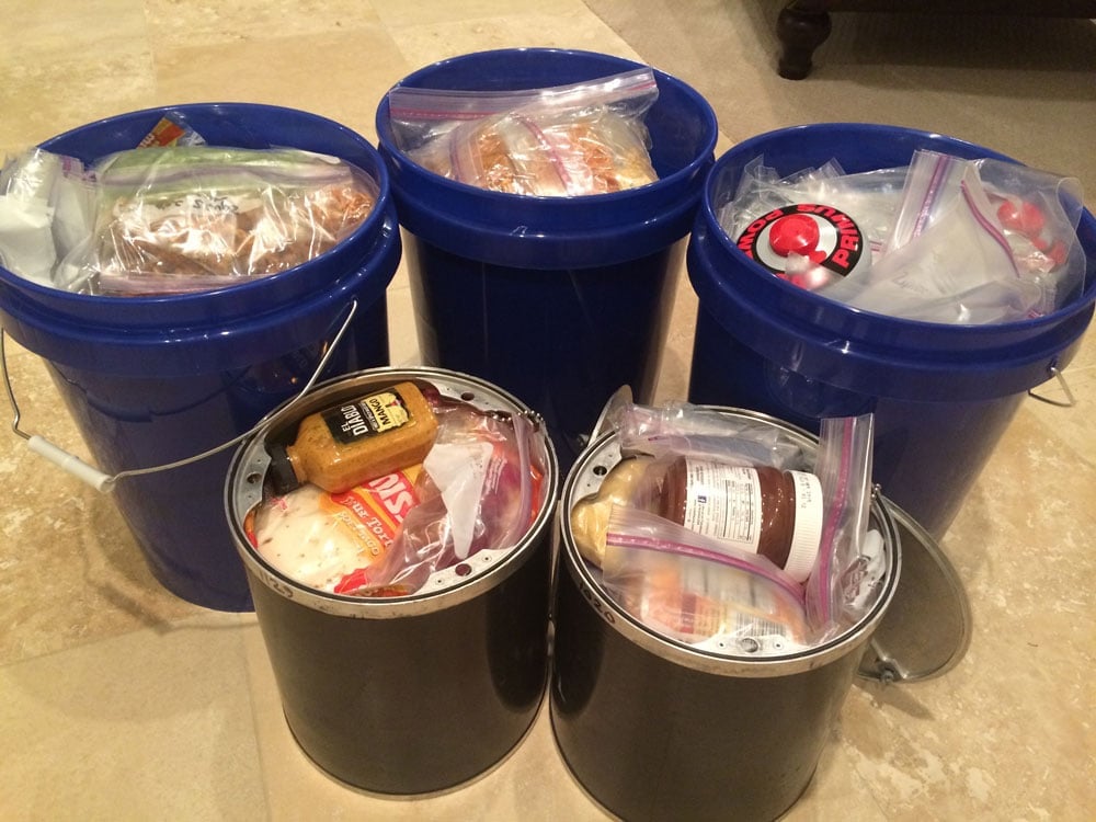 3 plastic buckets and 2 bear canisters for packing JMT resupply boxes