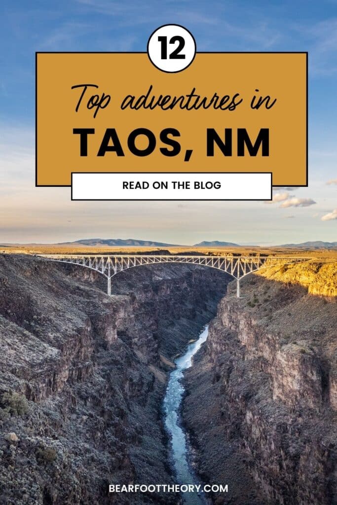 A bridge spans a deep canyon under a partly cloudy sky with text reading, "12 Top adventures in Taos, NM. Read on the blog. bearfoottheory.com.