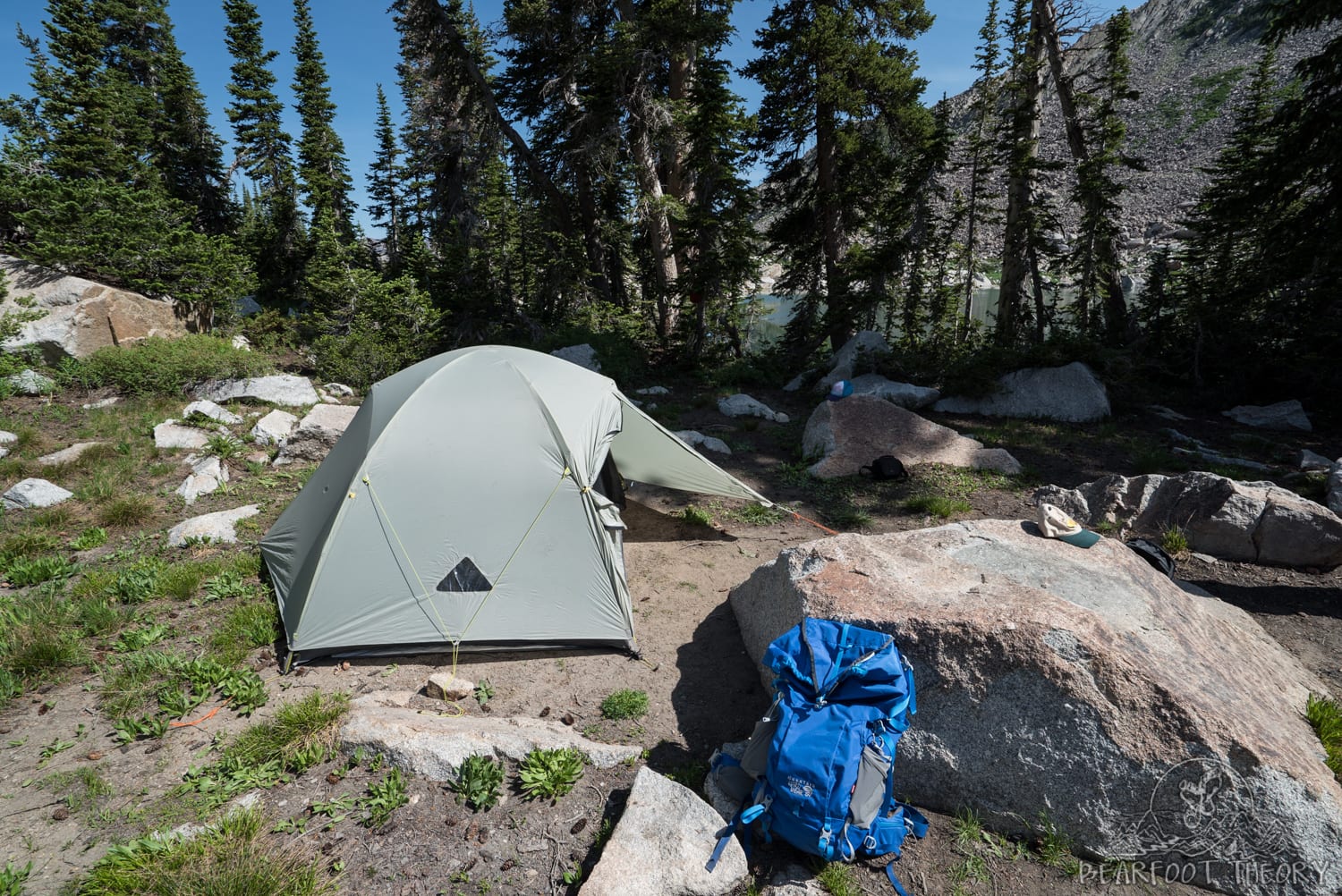 Tent set up among large rocks near Red Pine Lake in Utah