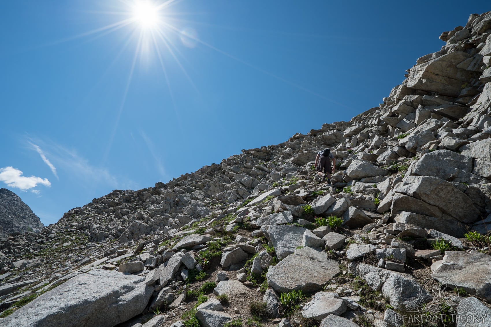 Hiking up through a boulder field on the Pfeifferhorn, the third tallest peak near Salt Lake City