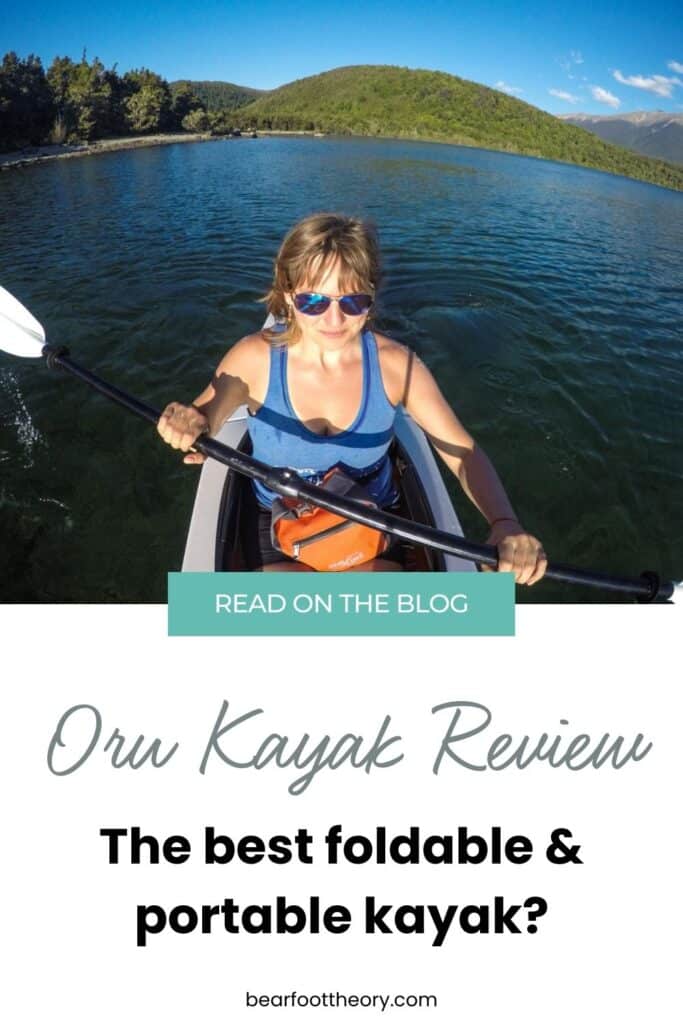 Photo of woman sitting in a kayak paddling on a lake. Text reads "Oru Kayak Review: the best foldable & portable kayak?"