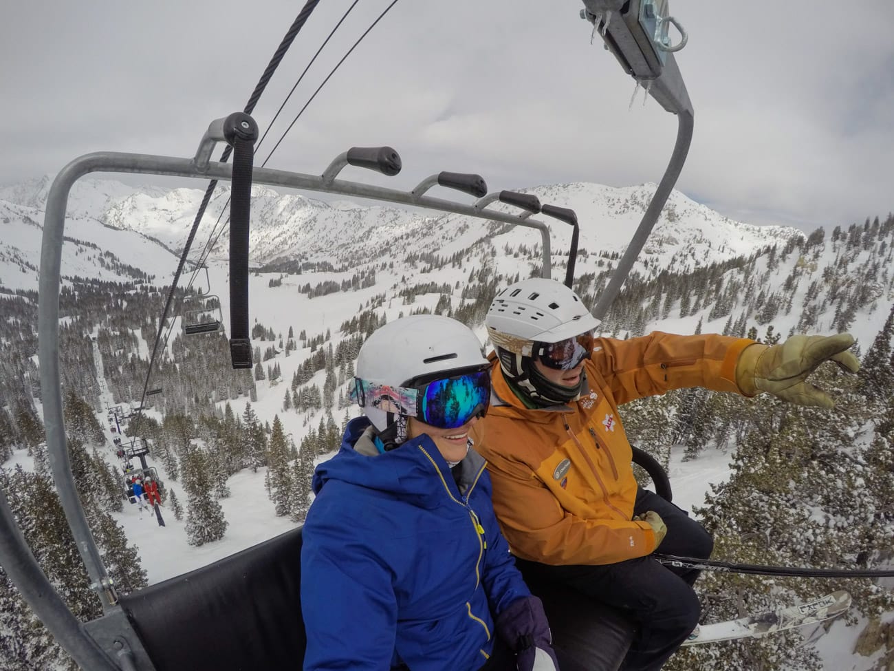 On the ski lift // Learn how to ski this winter with these beginner skier tips for adults. Find advice on gear, technique, form, lessons & more!