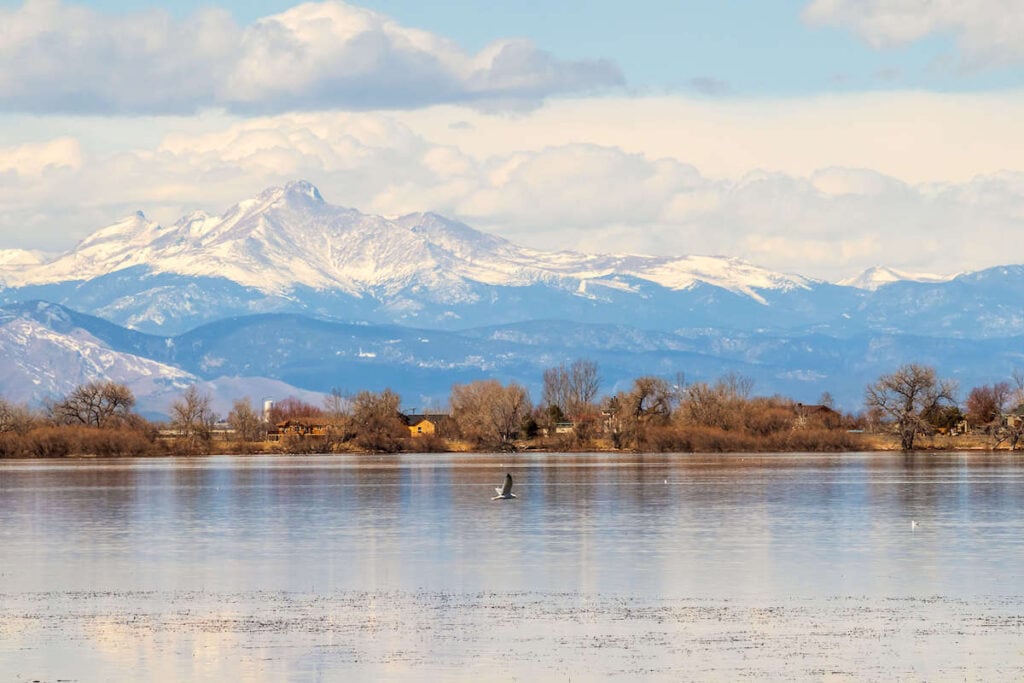 Barr Lake // Discover the best places to SUP in Colorado this summer with the best Rocky Mountain views, calm waters, and quiet solitude. 