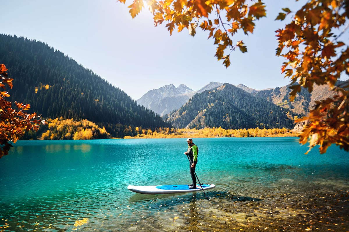 Discover the best places to SUP in Colorado with the best Rocky Mountain views and calm waters perfect for stand up paddling.