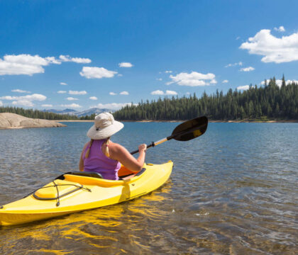 Woman kayaking on lake in Montana
