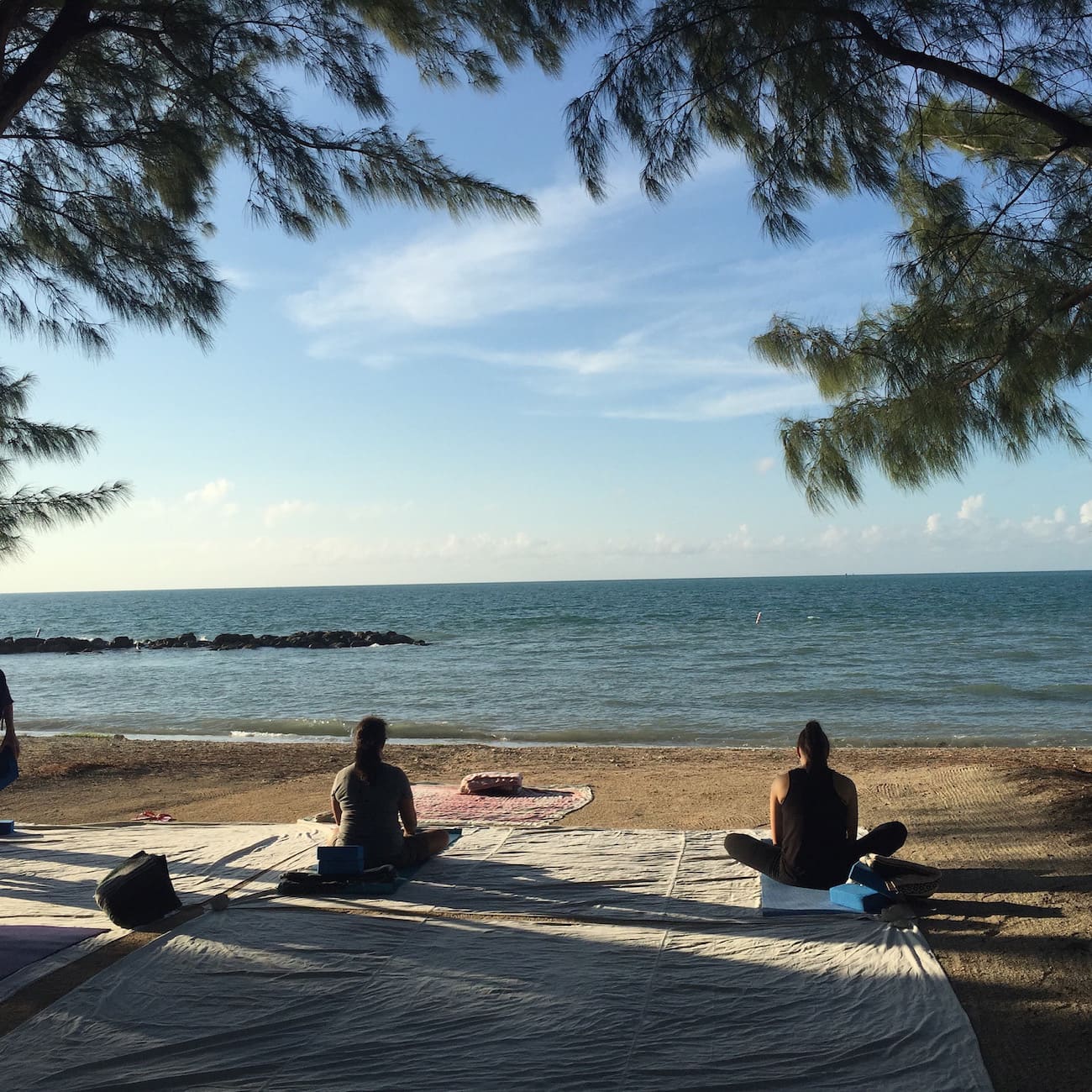 Yoga on the beach // Plan your Florida National Parks itinerary with this 7-day road trip guide that visits Key Biscayne, Everglades & Dry Tortugas National Parks