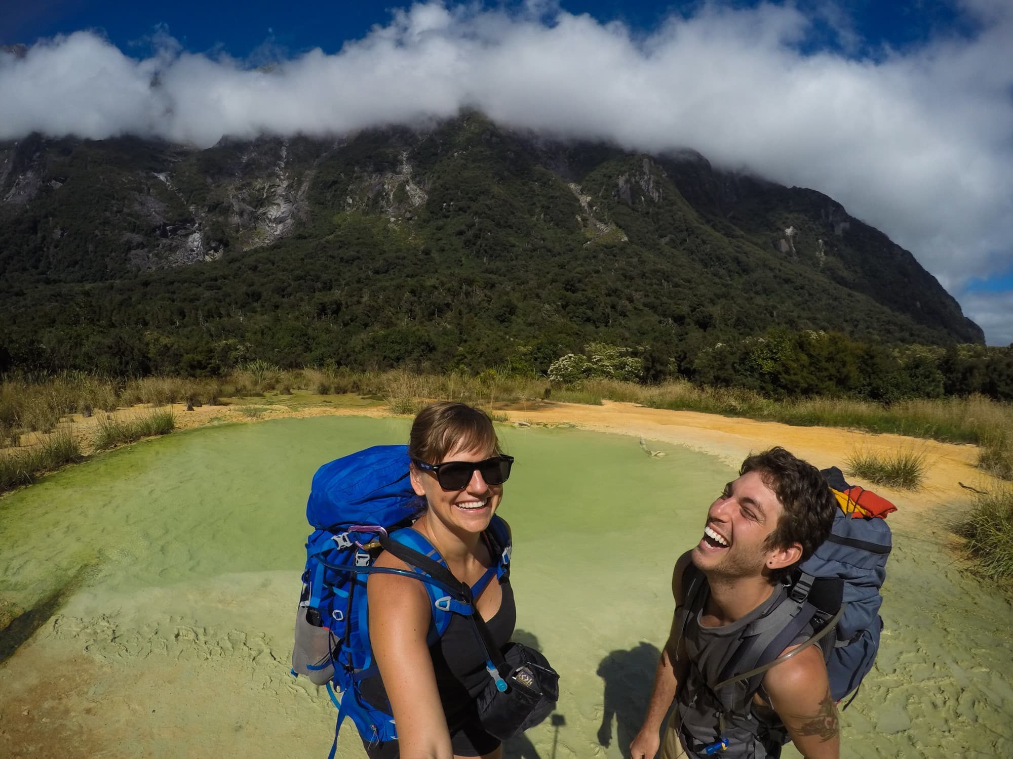 The Copland Track on New Zealand's South Island is an incredible overnight backpacking trek with dense forest, glacier rivers, alpine views, and HOT SPRINGS! See the pics and learn how to plan this must-do trek with this backpacking guide!