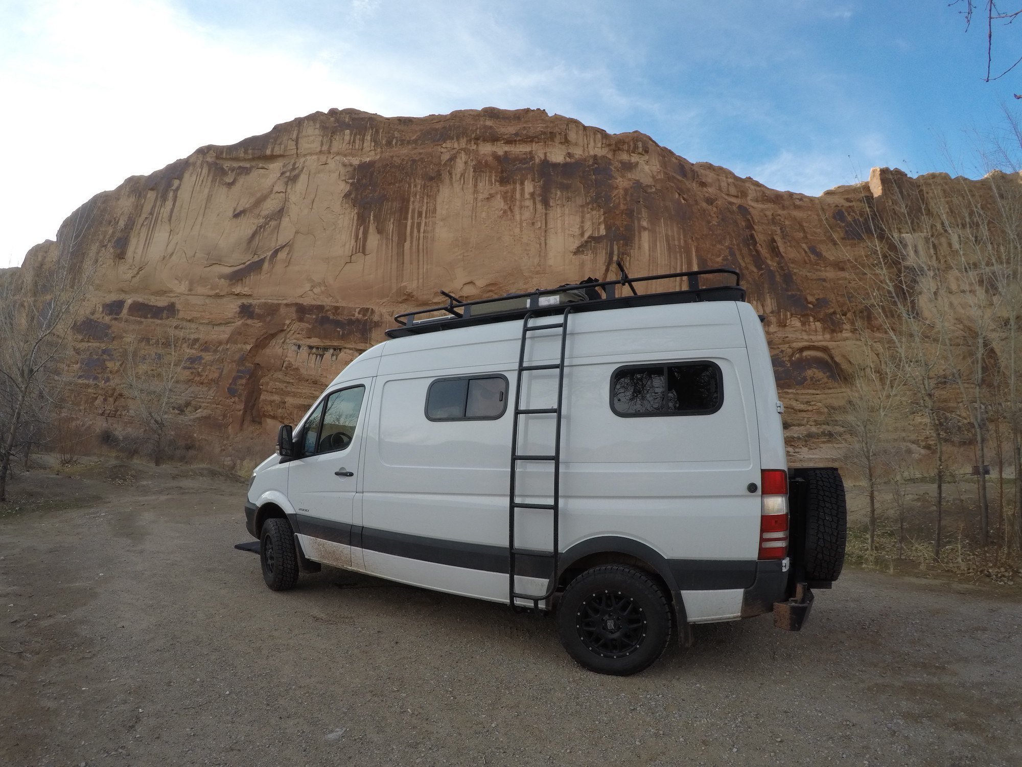 A detailed Aluminess review with pros/cons & a video tour of my Aluminess Sprinter Van roof rack, ladder, and rear bumper storage system.