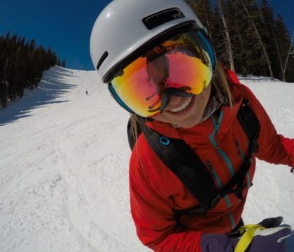 What to wear skiing - the ultimate guide to skiing apparel so you have the right clothes for staying warm, dry, and comfortable on the slopes.