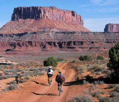 Plan your mountain biking trip on the 100-mile White Rim Trail in Canyonlands National Park. Learn about permits, itineraries, gear, campsites & more.