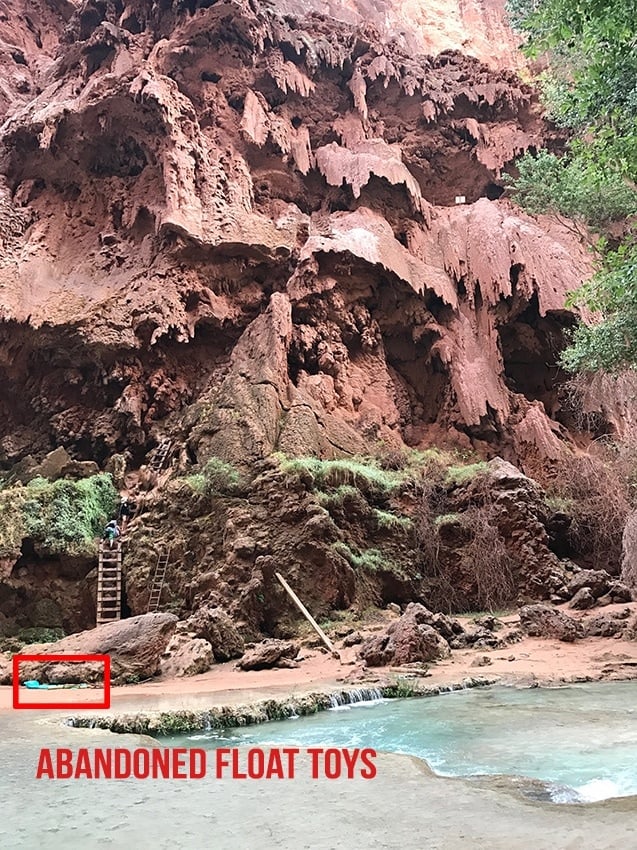 Abandoned pool floats at Havasu Falls in Arizona. Pool floats are not allowed in Havasupai