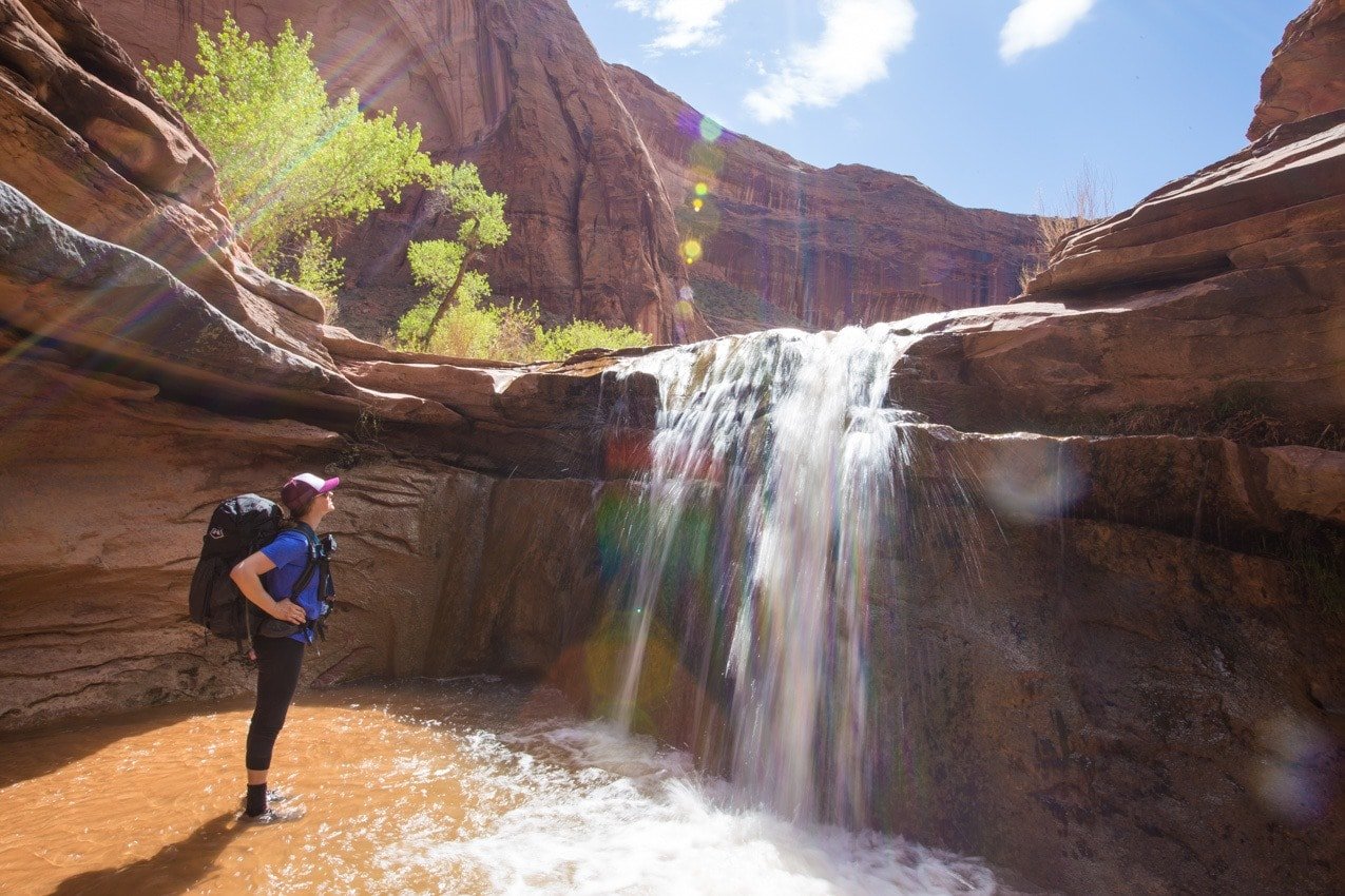 Plan your Coyote Gulch backpacking trip through slot canyons in Utah's Escalante National Monument with our guide to gear, permits, & more.