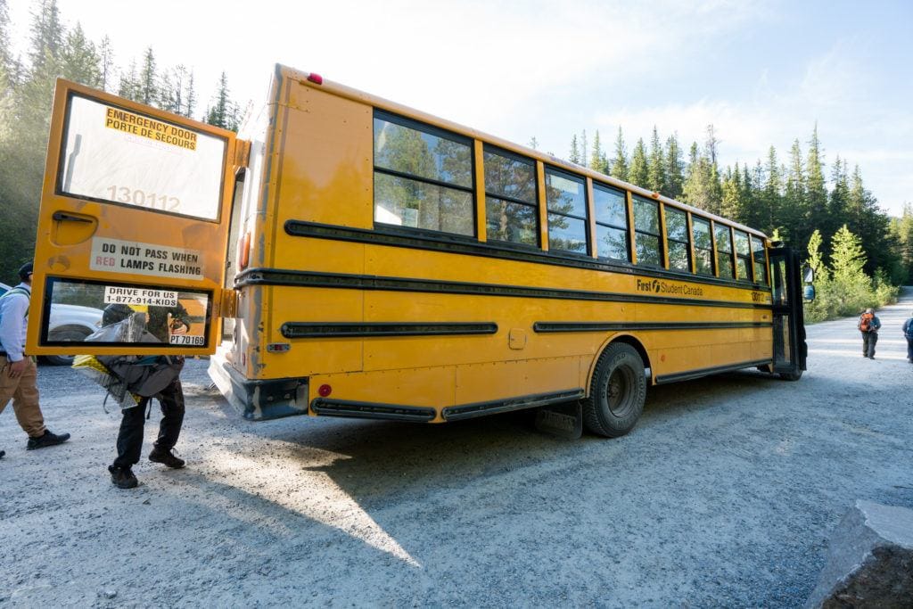 School bus taking hikers and campers to Lake O'Hara in Yoho National Park in British Columbia