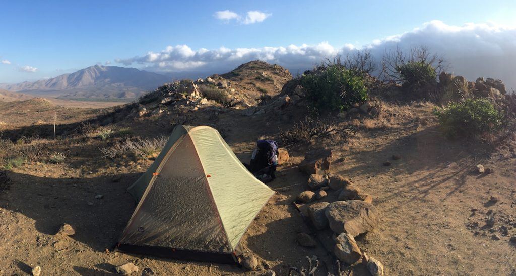 Tent set up in along the Pacific Crest Trail in high desert of Eastern Sierra mountains of California