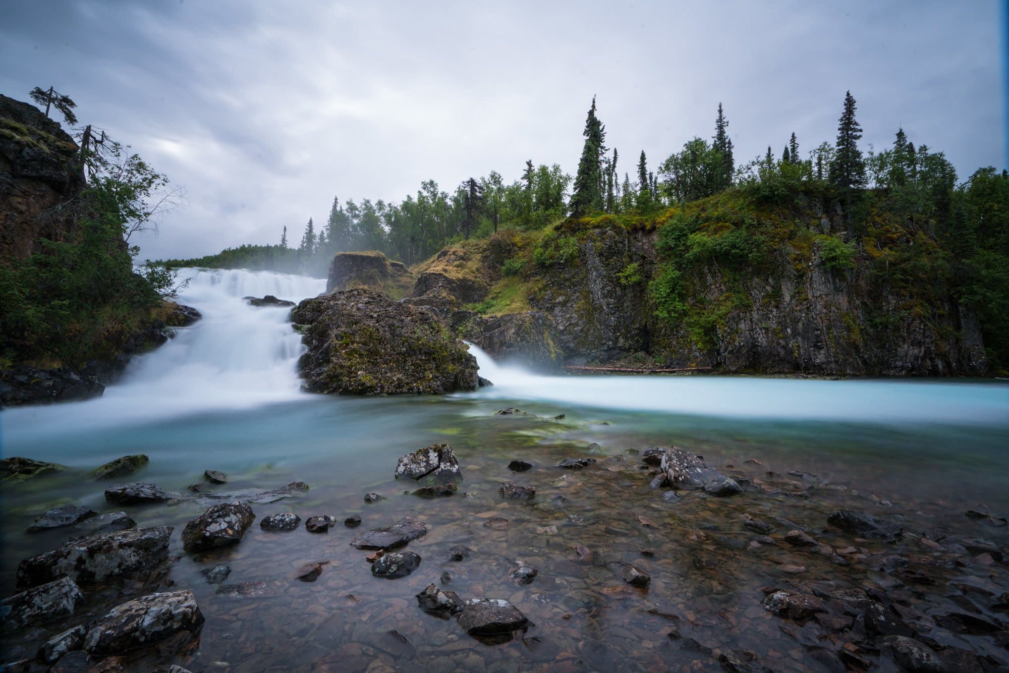 waterfall hike in Lake Clark National Park // Planning a trip to a popular National Park? Here are tips to beat the crowds and have an enjoyable visit in overcrowded National Parks.