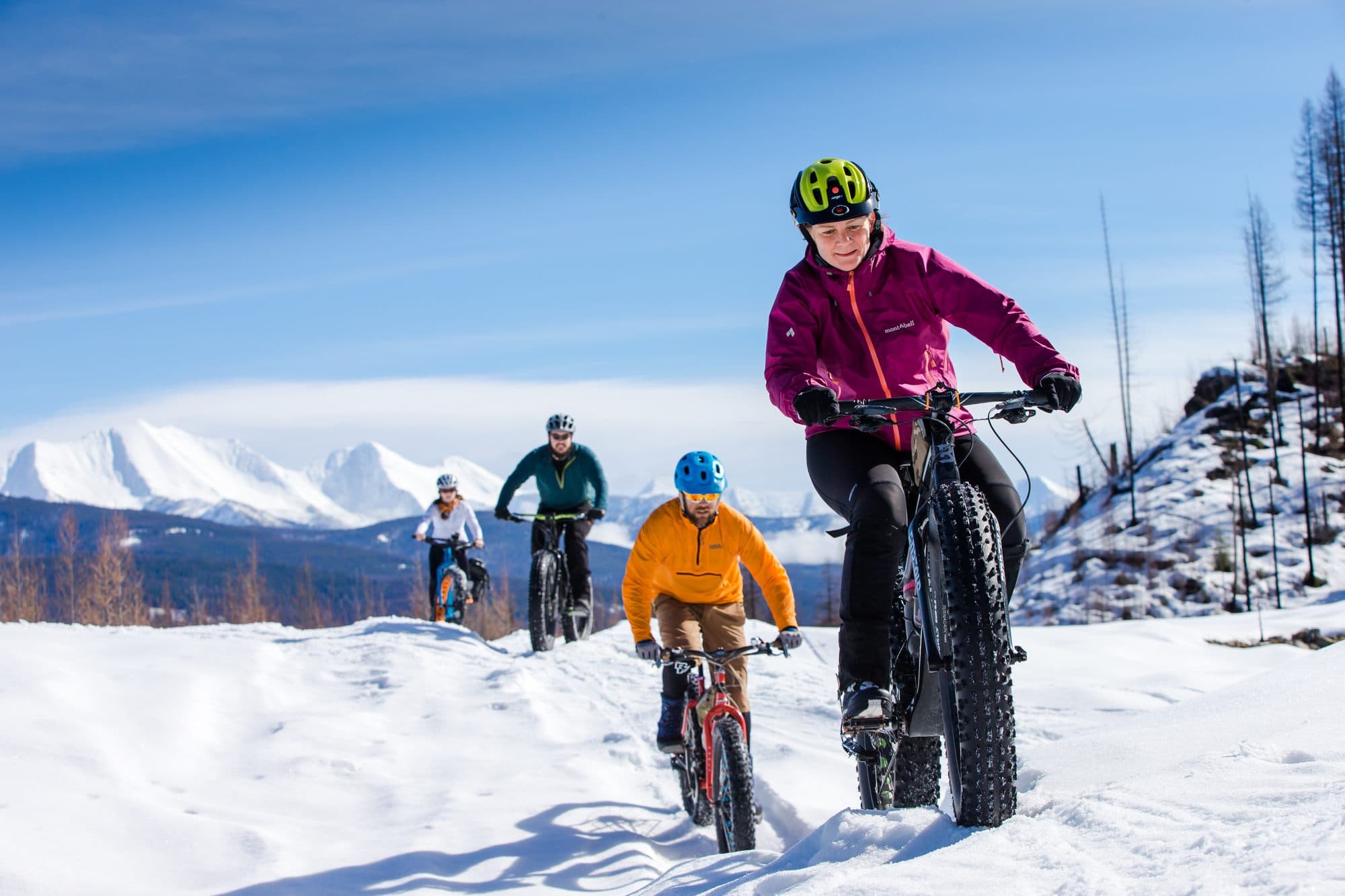 Winter fat biking in Montana // From hot springing to dog sledding to skijoring, plan an adventurous vacation to Montana in winter with these 8 outdoor winter activities.