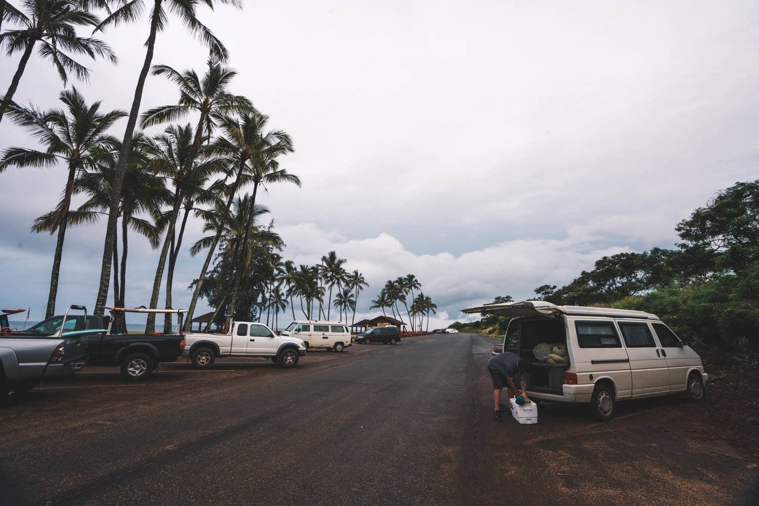 Thinking about renting a 4x4 truck camper or VW-style campervan on Kauai? Read about my vanlife experiences during a recent Kauai vacation. Learn the beach campgrounds where it is legal to sleep in your car, and see if renting campervan is the right choice for your Kauai adventures.