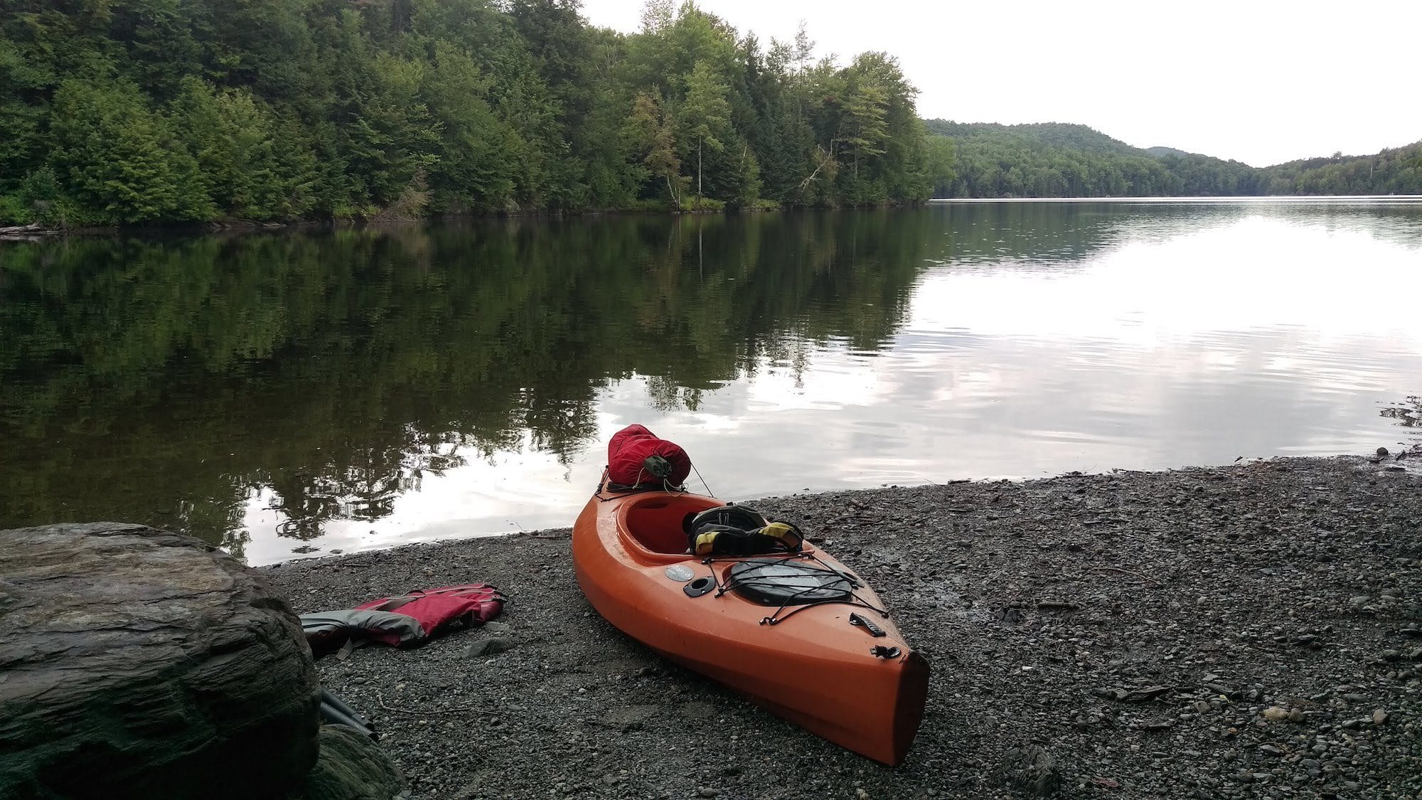 Kayak on beach at Green River Reservoir in Vermont