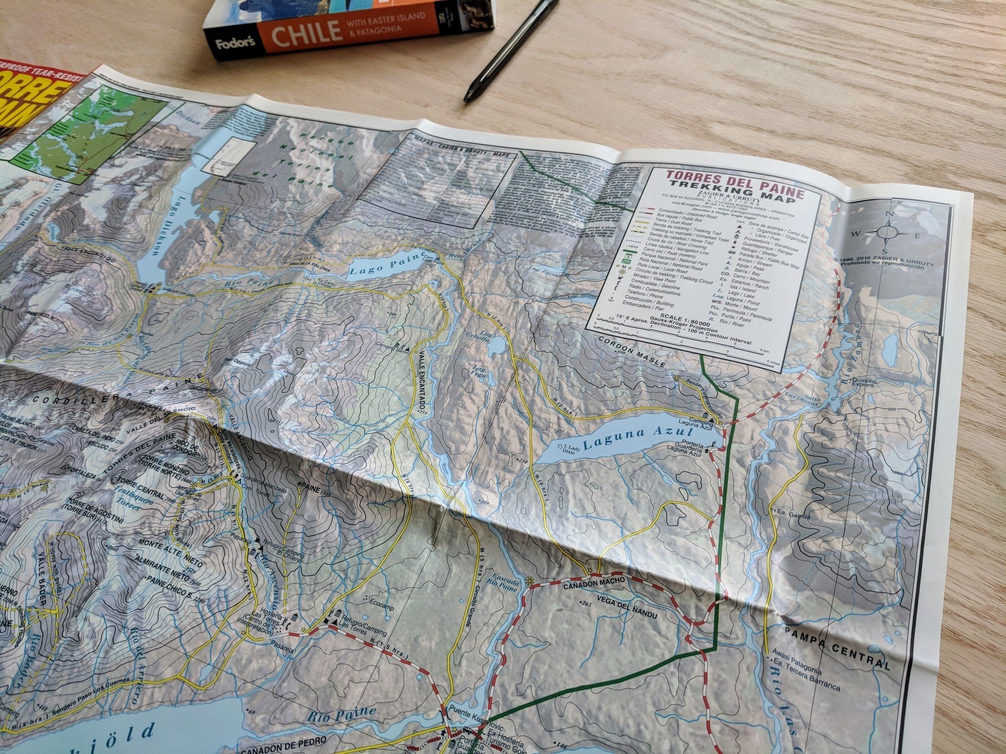 Topo graphic map laid out on a table