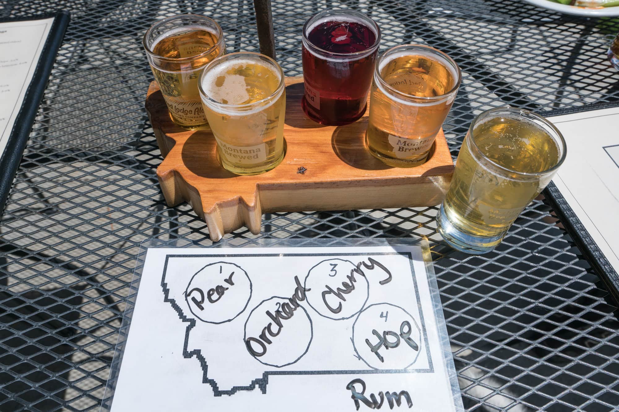 Flight of ciders on a wire table