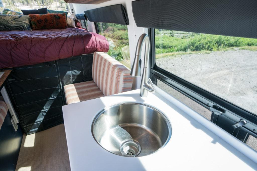 Sink and faucet in converted Sprinter van