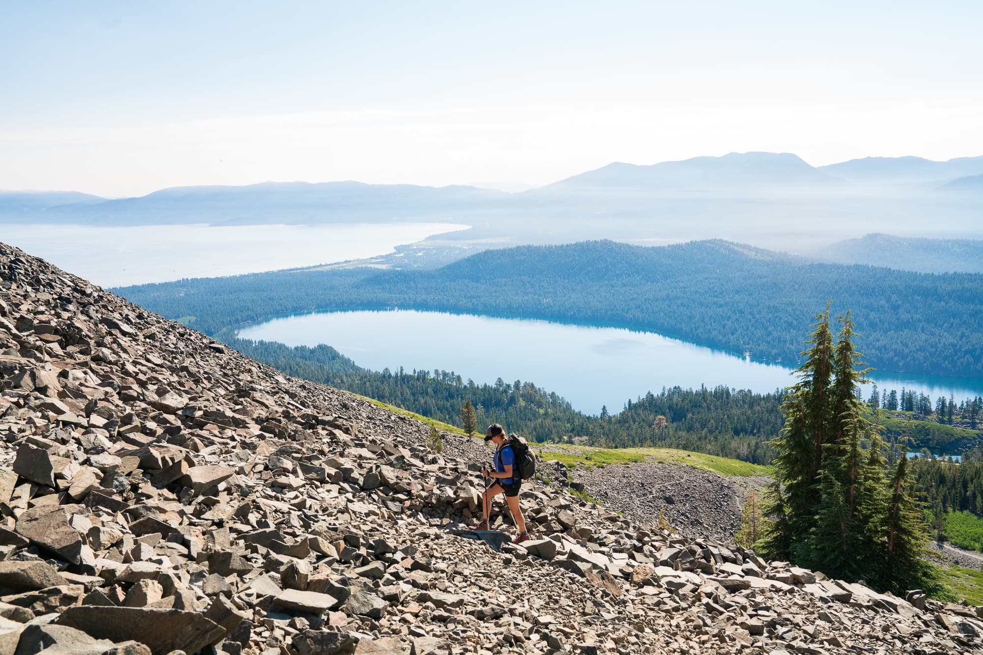 A woman hikes Mount Tallac near Lake Tahoe California