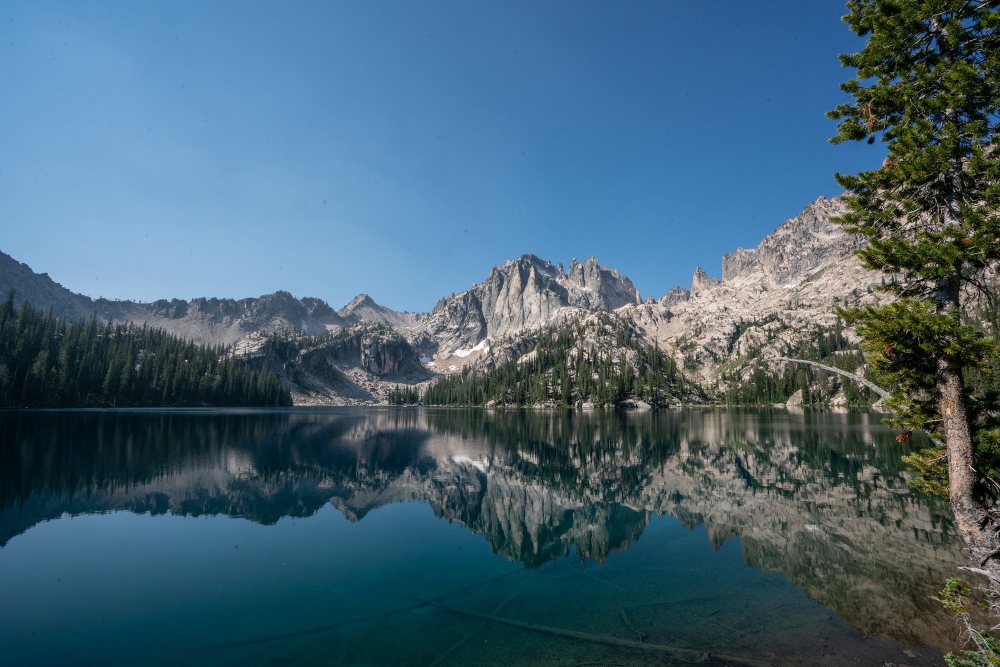 Baron Lakes is one of those iconic hikes in Idaho's Sawtooth Mountains with several high alpine lakes to choose from and wide open views of the jagged Sawtooth Range.  Get my trail and campsite tips with this detailed Baron Lakes backpacking guide.