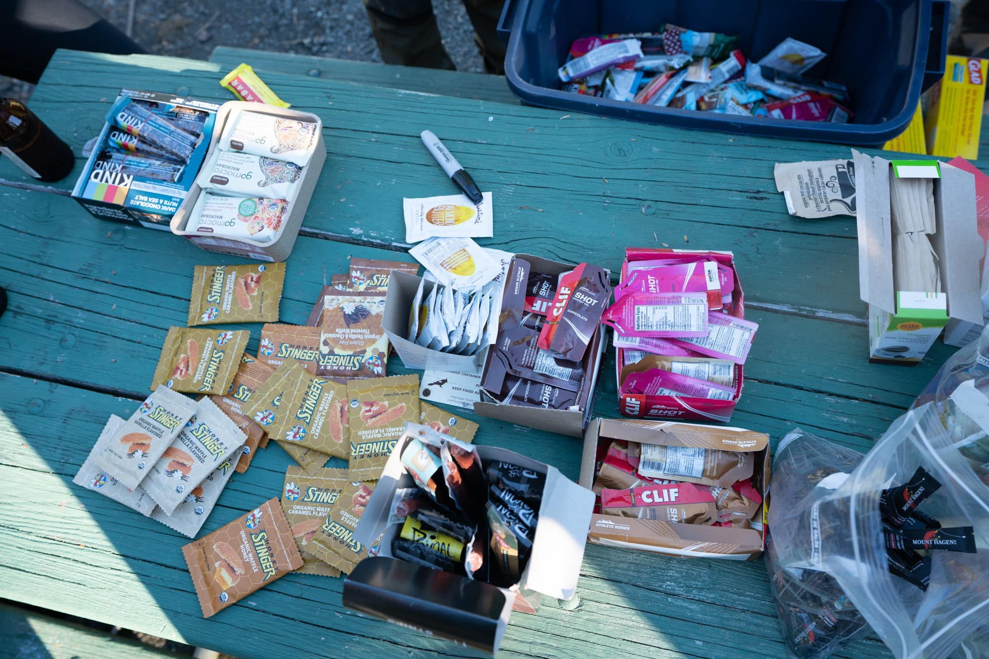 Hiking snacks laid out on picnic table