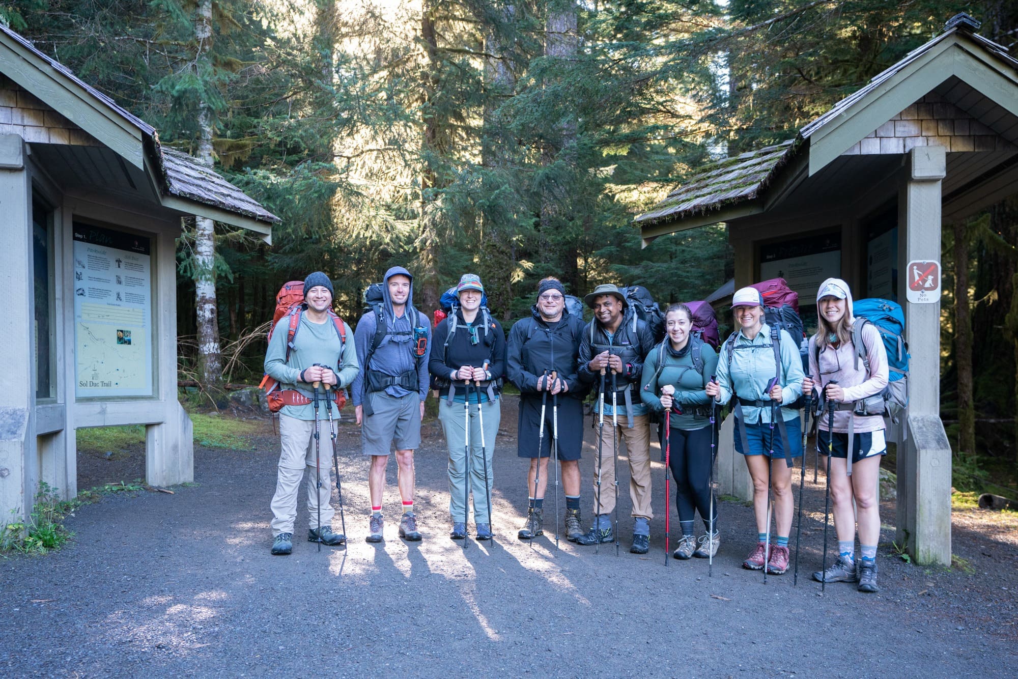 Backpackers in a line for photo at Sol Duc Trailhead in Washington
