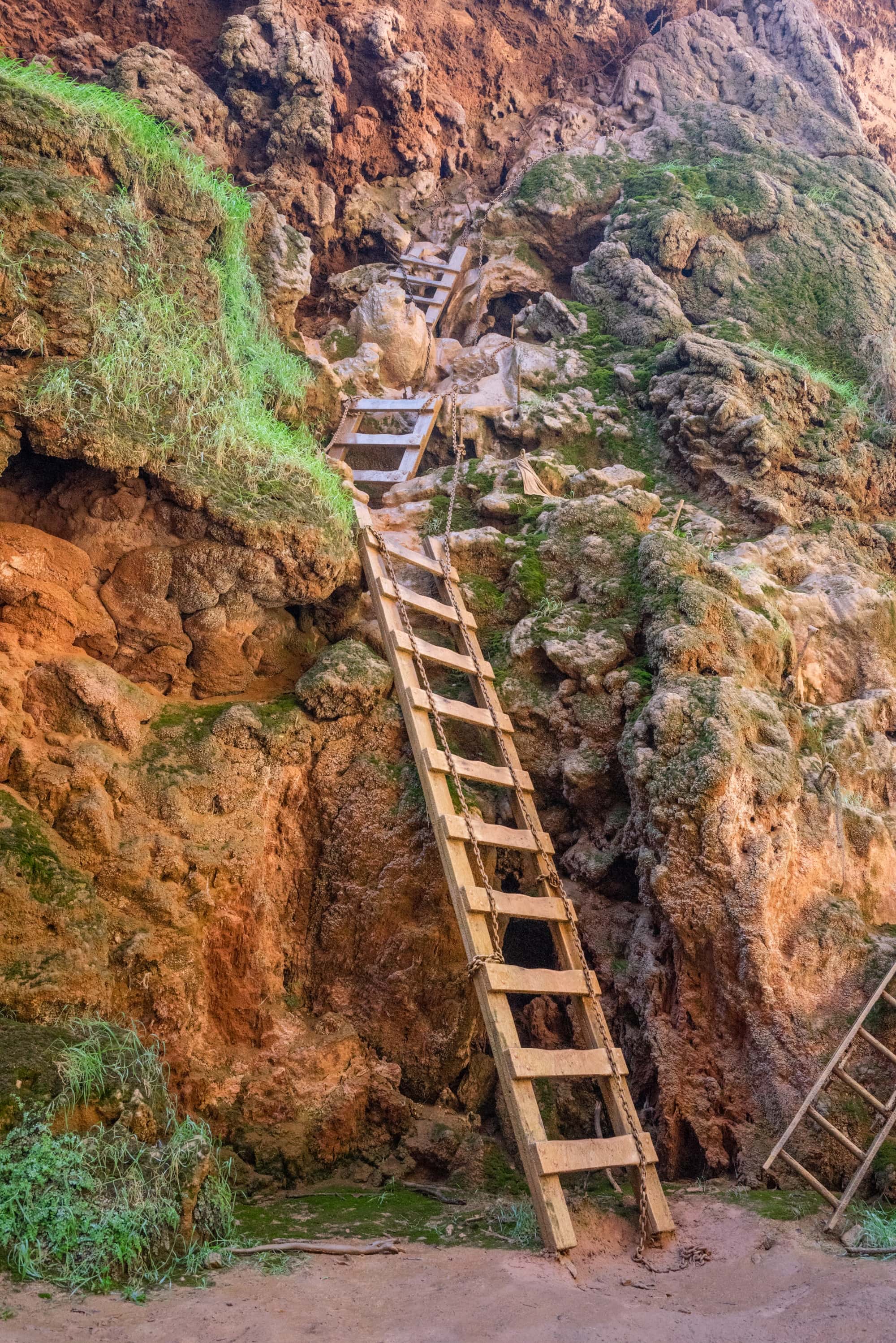 Wooden ladders leading down to Mooney Falls in Havasu Canyon