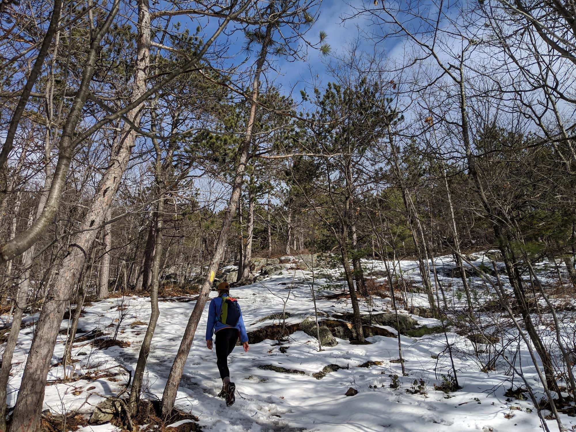 Looking for a winter hike in New Hampshire? This trail guide to hiking South Mount Mountain in the winter covers what to expect and more.