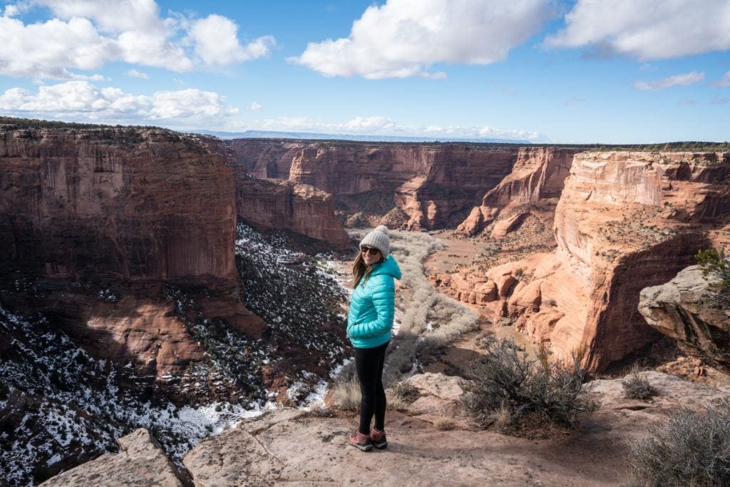 Bearfoot Theory founder Kristen Bor standing on the rim of Canyon De Chelley in Arizona