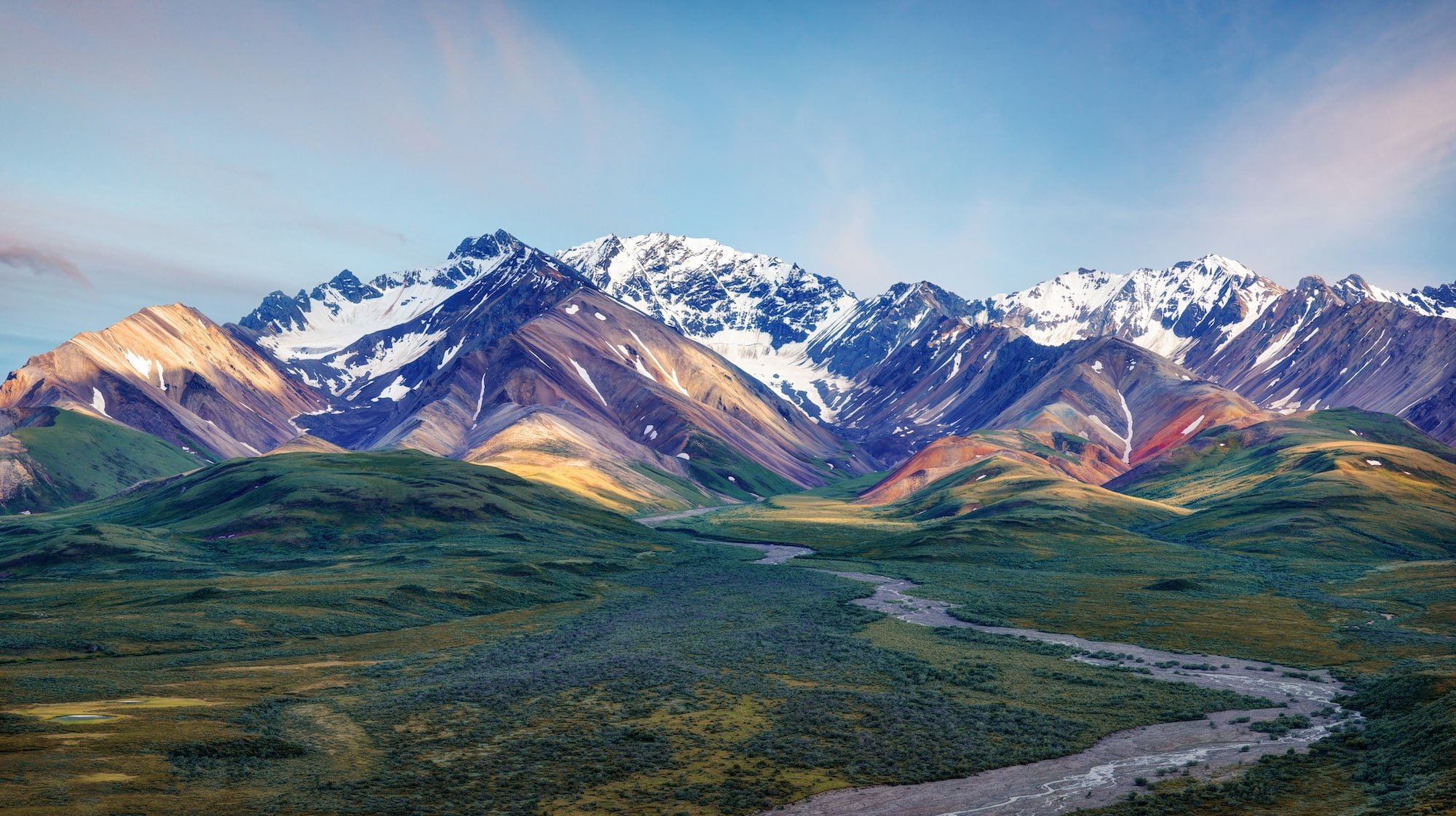 Denali National Park makes the roundup of 14 amazing domestic & international travel destinations at the top of our adventure bucketlist for 2019.