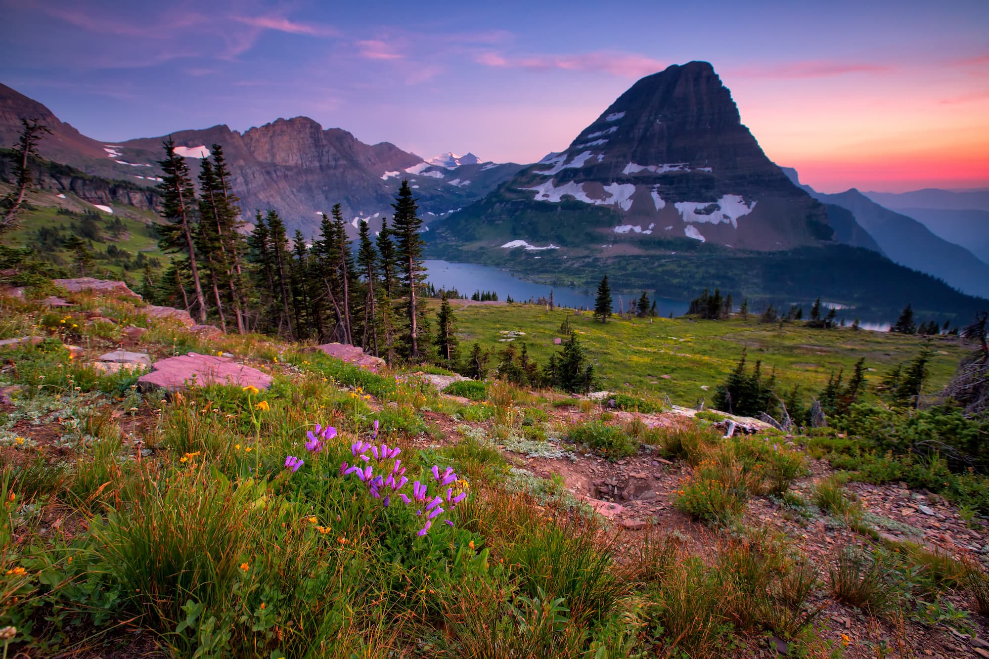 Glacier National Park makes the roundup of 14 amazing domestic & international travel destinations at the top of our adventure bucketlist for 2019.