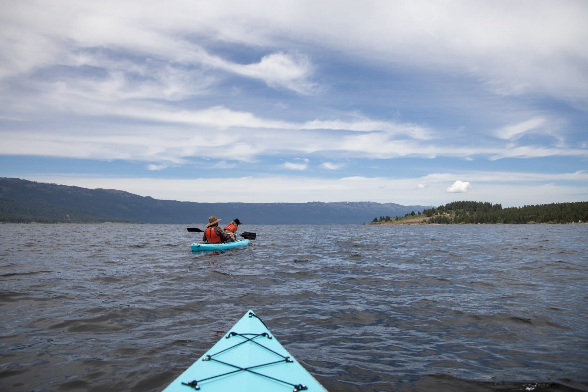 Kayaking on Lake Cascade // Explore the best outdoor recreation in Cascade, Idaho with this 4-day itinerary featuring hot springs, hiking, off-roading, biking, and more.