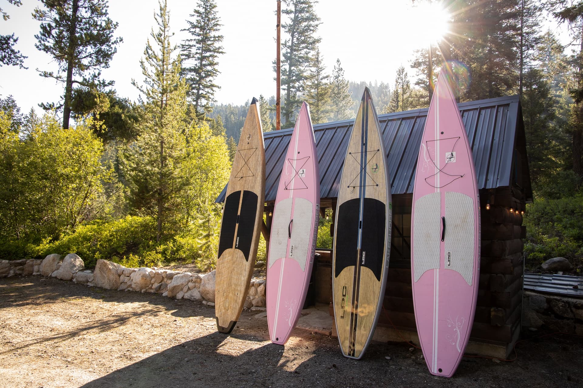 Plan a relaxing getaway to a cozy cabin at Cascade Idaho's Warm Lake Lodge where you can paddle board, boat, birdwatch, soak in hot springs & more.