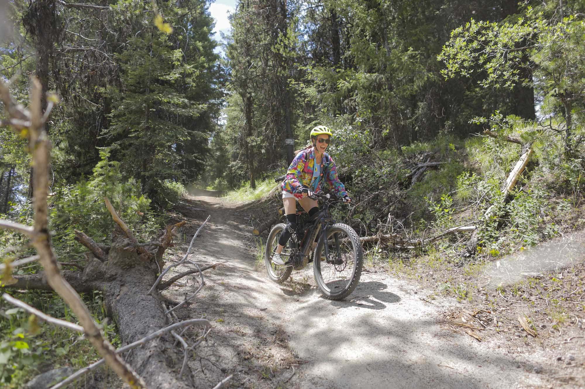 Woman mountain biking at Open Roads Fest