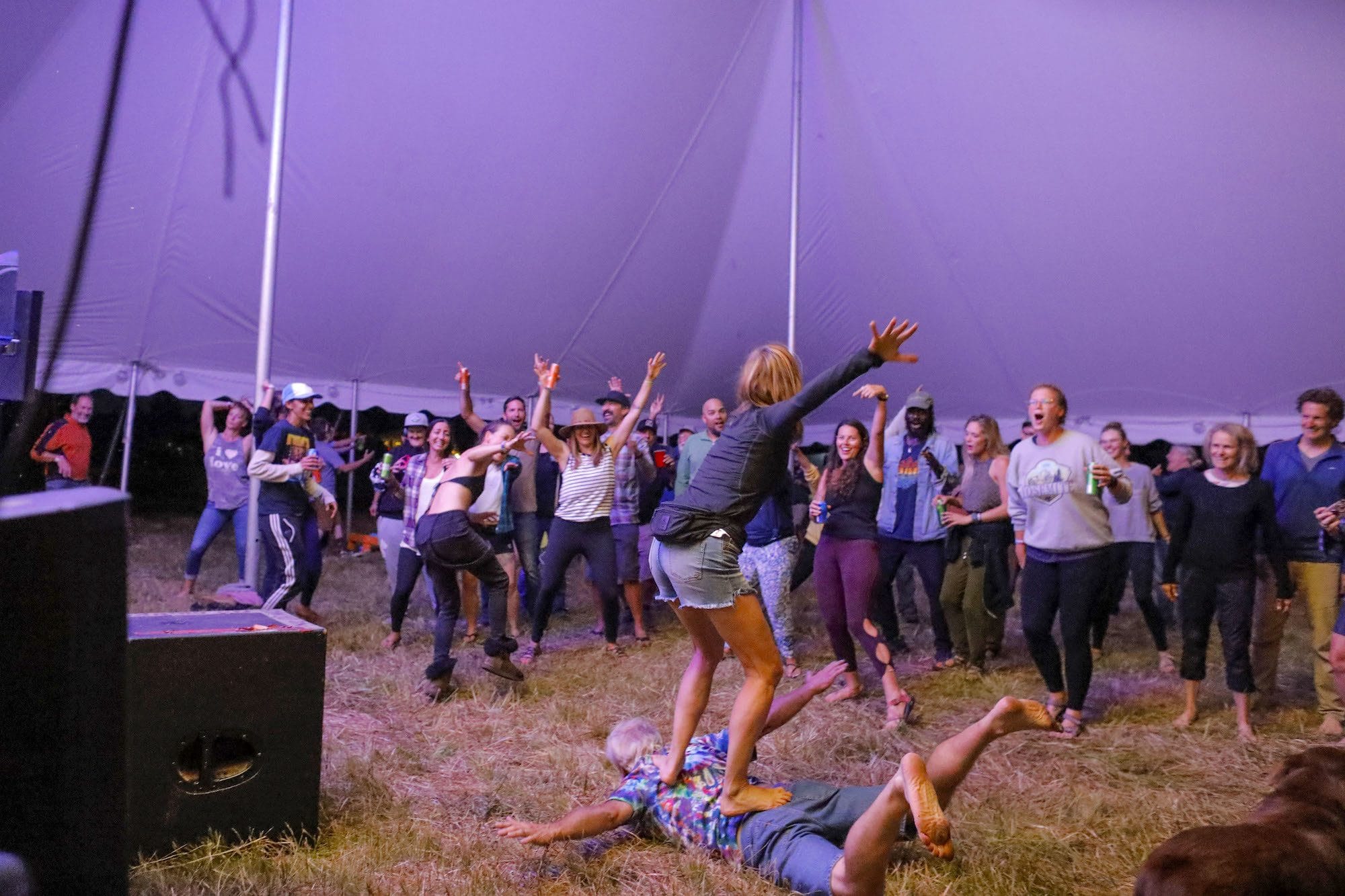 People dancing under a tent at Open Roads Fest van life festival