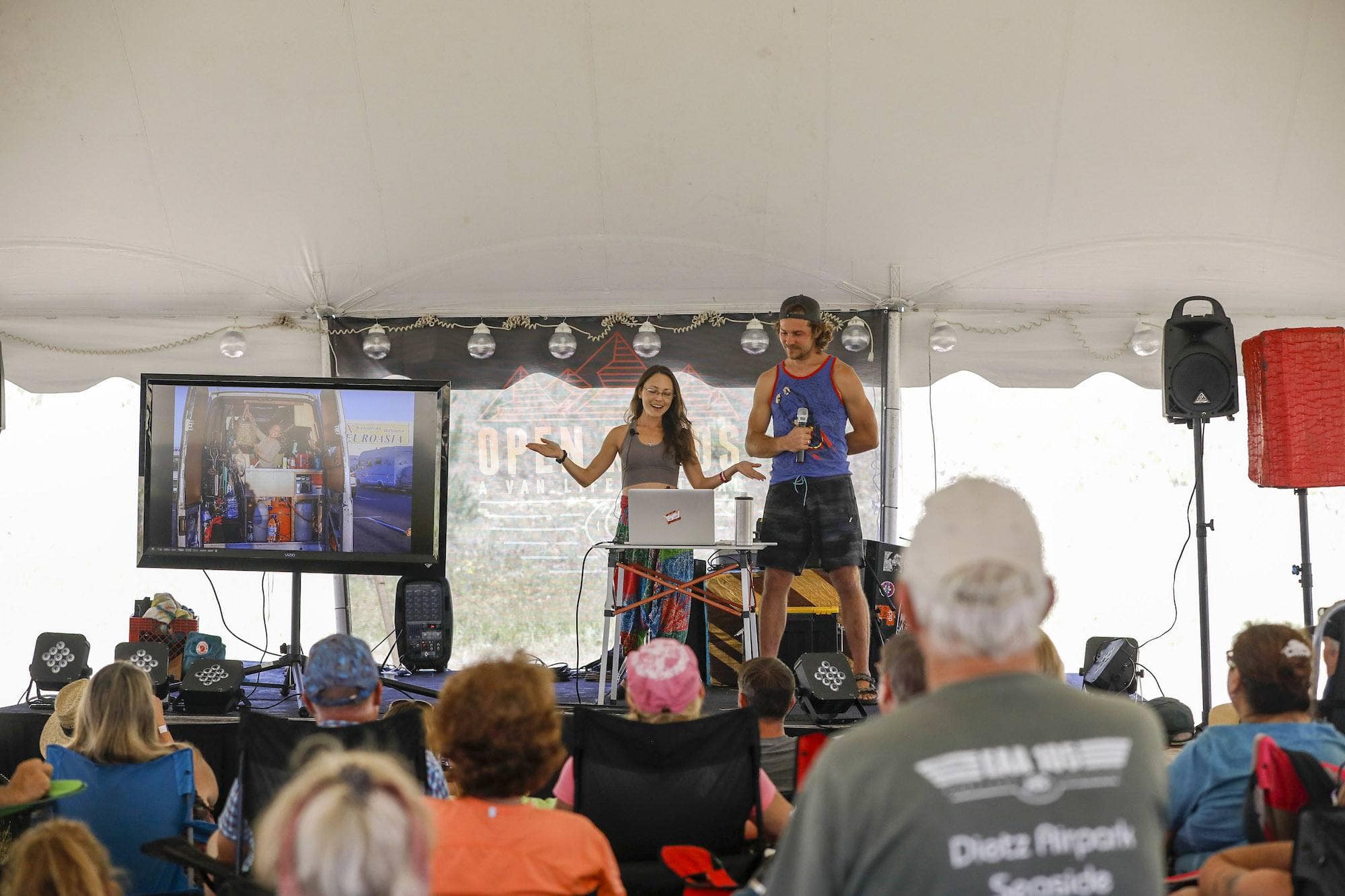 A couple leading a workshop at Open Roads Fest, a van life festival and campout in McCall, Idaho