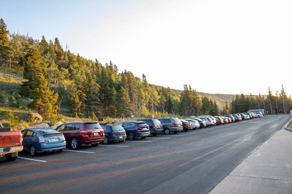 Glacier Gorge Parking Lot // Get our top tips for visiting Rocky Mountain National Park including when to go, where to camp, hiking tips, how to beat the crowds, and more.