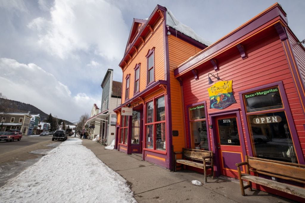 Elk Street // Check out this complete Crested Butte winter travel guide to enjoy this Colorado winter wonderland town for skiing, biking, hiking, and more.