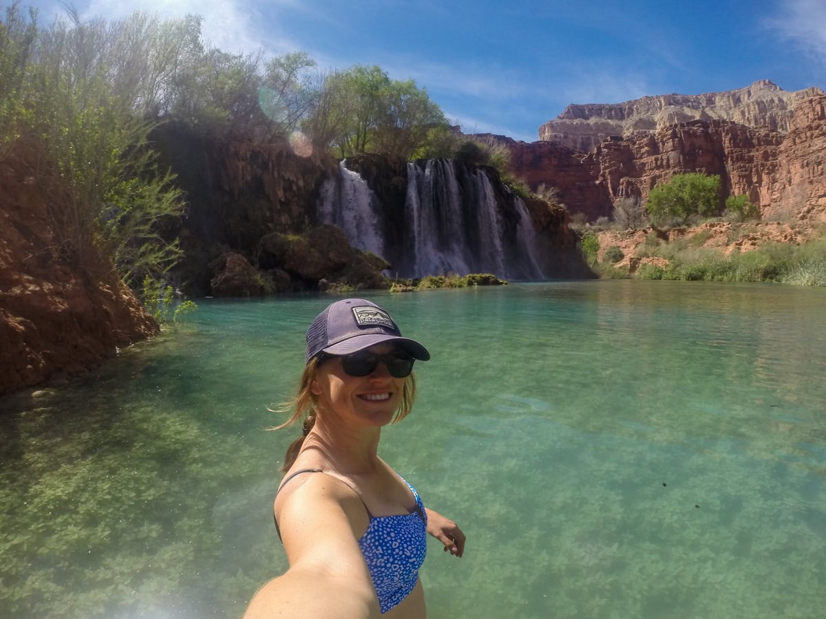 Kristen Bor swimming in a waterfall called Fifty Foot Falls