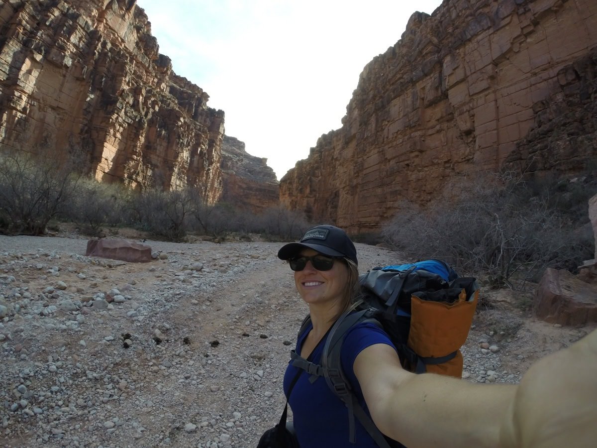 Kristen Bor hiking in a desert canyon from Havasu Falls