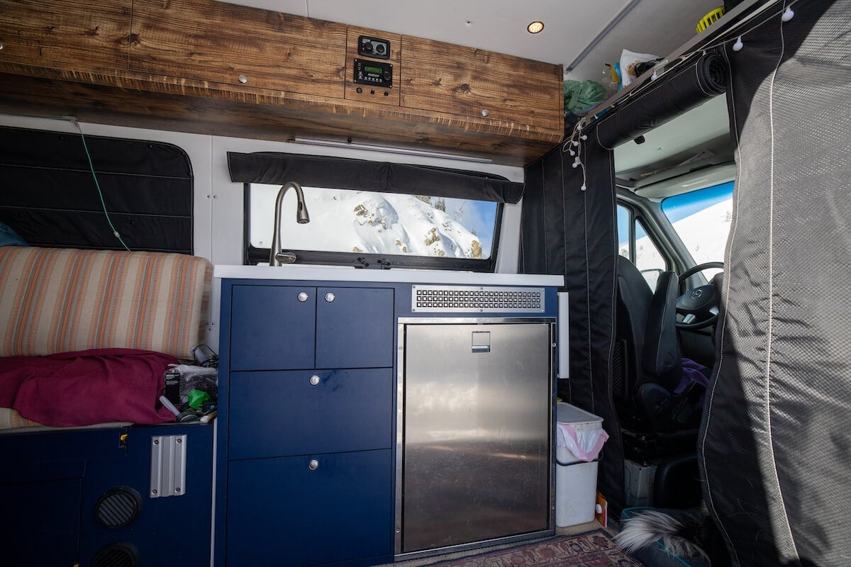 Learn about van appliance options for your van galley including the best campervan fridges, campervan stoves, ovens, sinks, and more.