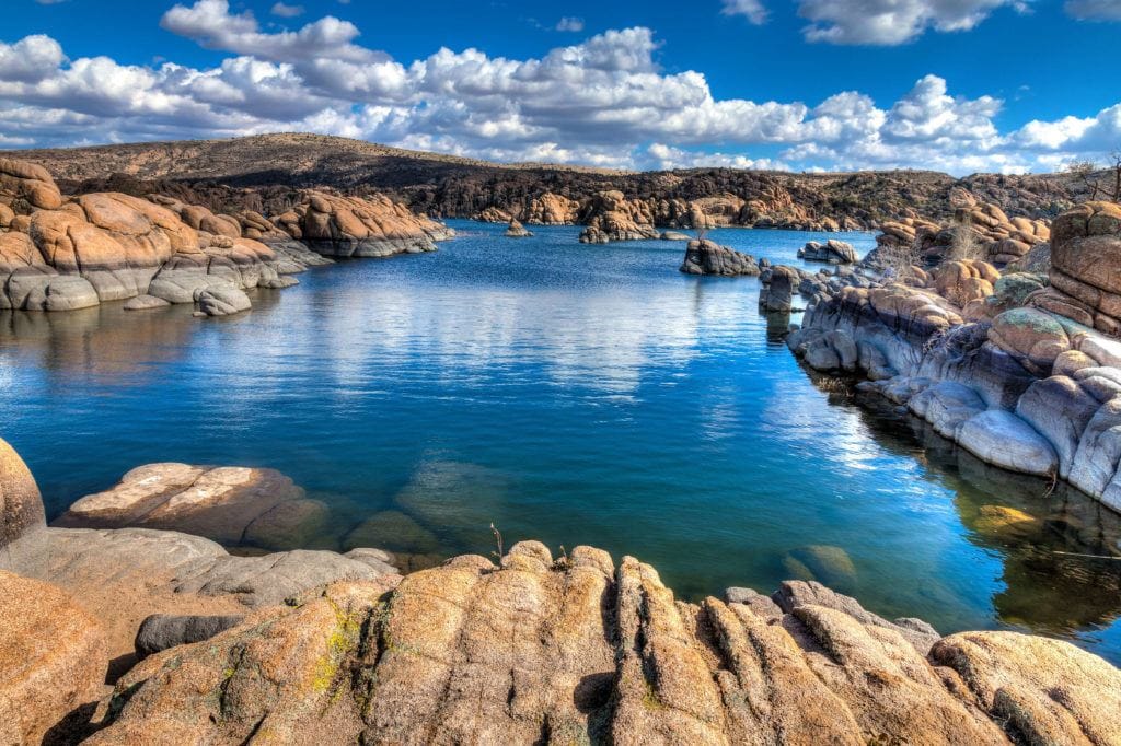 Watson Lake in Prescott, Arizona surrounded by rock slabs