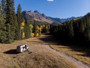 Learn where and how to find free campsites on your next trip with this list of the best websites, apps & maps for finding dispersed camping.