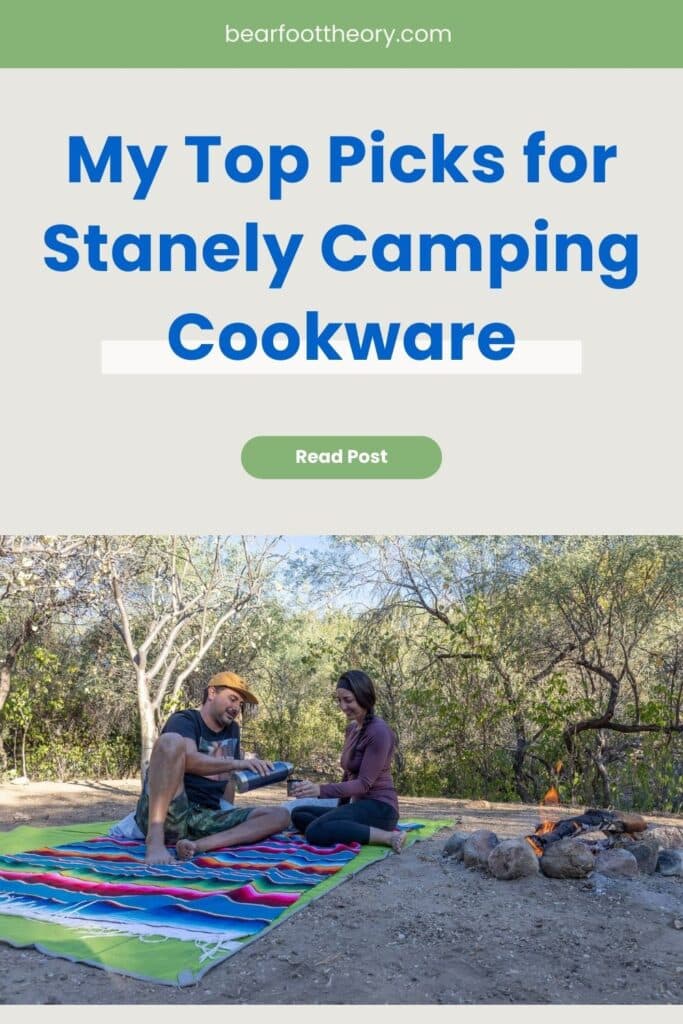 A man pouring a woman a drink from a bottle on a blanket with a campfire with text that says "My top picks for Stanley camping cookware"