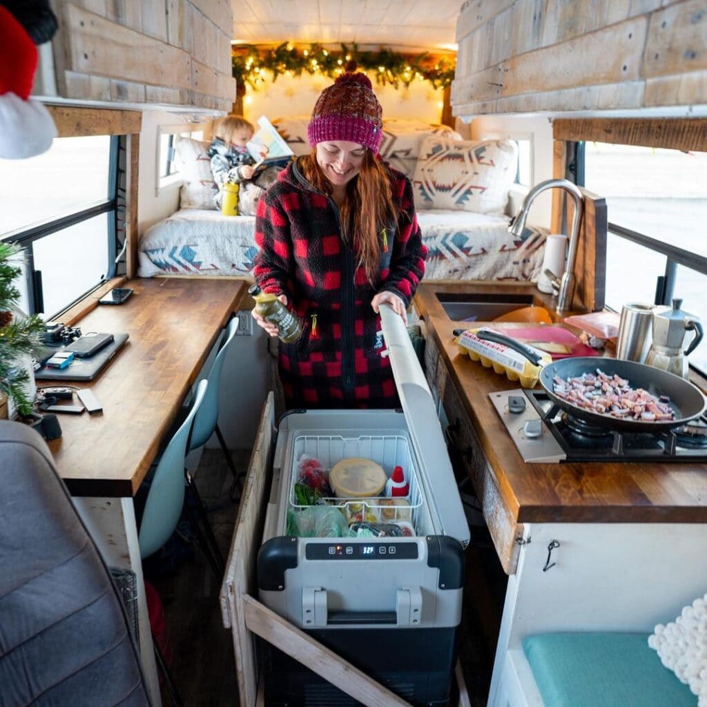 Van life kitchen by @rebornbyadventure / Check out these van galleys for ideas on layout, appliances, storage, and more.