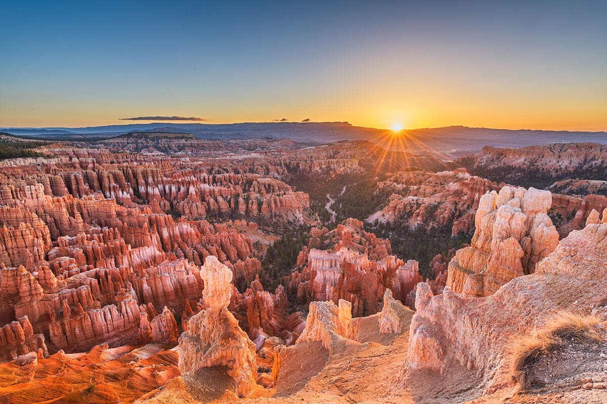 A view of the sun setting from Sunset Point in Bryce Canyon National Park.